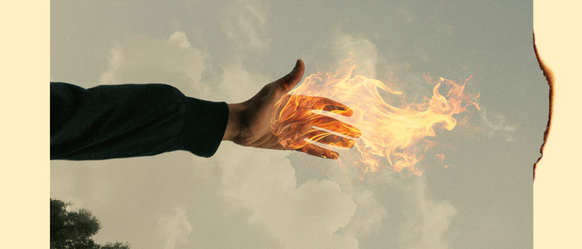 Een uitgestoken hand in een lange mouw raakt een andere hand van vuur aan, tegen een achtergrond van bewolkte lucht en verbrand papieren rand.