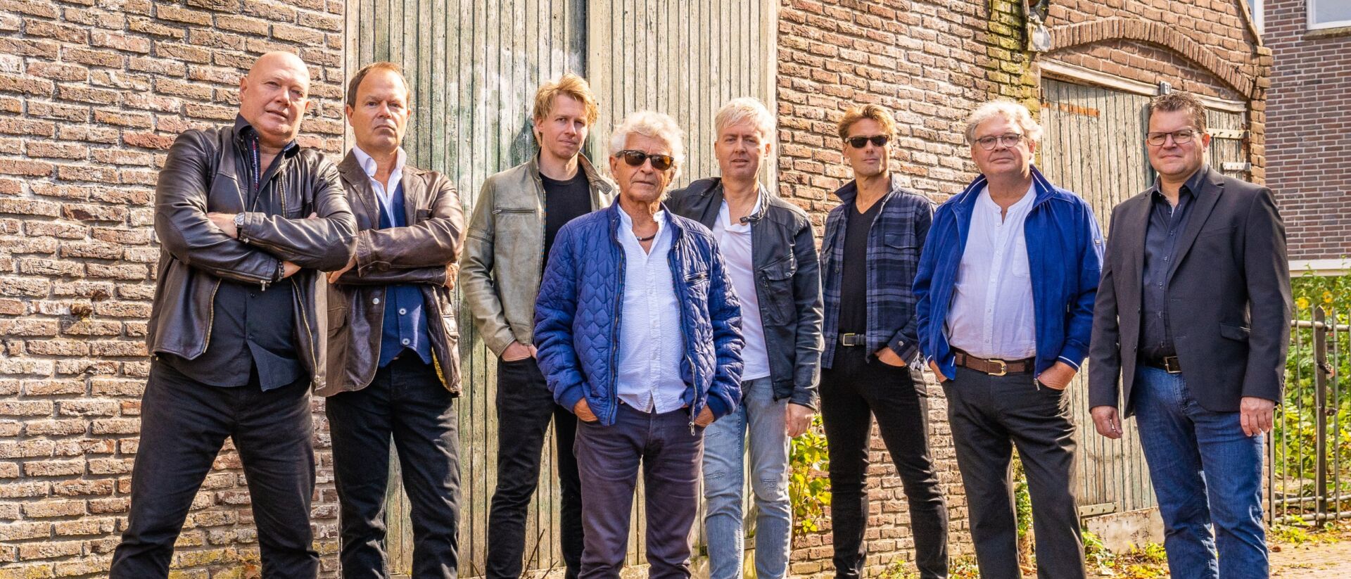 groepsfoto van de band
