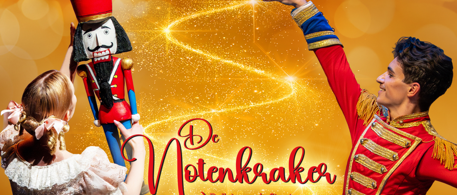 Dansers van Staatsopera Bulgarije in De Notenkraker met notenkrakerpop op gouden achtergrond
